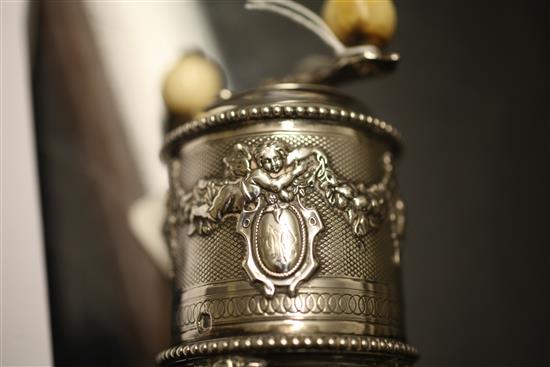 An ornate 19th century French silver drum shaped peppermill, 4in.